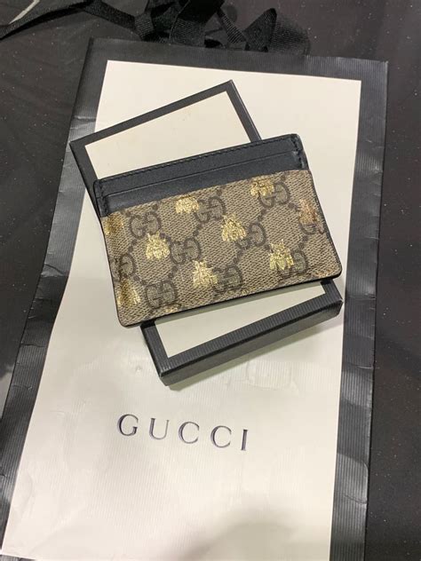 gucci beige gg supreme bee card holder|Bee print GG Supreme card case .